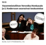 Andersson ja Honkasalo nojaavat kyynärpäällä pöytään nojaten pääätään nyrkkiinsä.  Liillä tonninseteli ja Honkasalolla erittäin kummeksuva ilme.  Puhekuplat "Mit vit?" ja "Ei juma!"