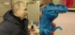 Vladimir Putin or his double who looks like a deformed toy dinosaur.