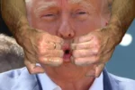 Donald Trump's face with his mouth open and goatse arms on the sides of his mouth so it looks like theyre opening his mouth.