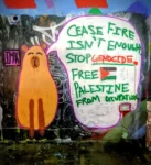 Painting on a wall of a capybara saying "Ceasefire isn't enough. Stop Genocide. Free Palestine from Occupation"